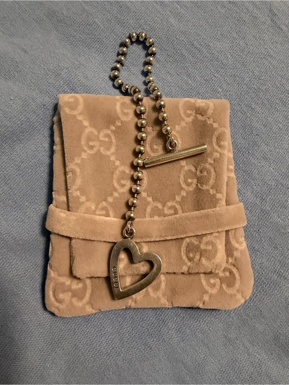 Gucci Gold Heart Charm Bracelet with Beige Suede Pouch